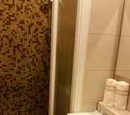 ห้องน้ำภายในห้อง 5 Affittacamere da Ginetto