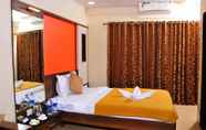 Bedroom 2 Aakash Hotel