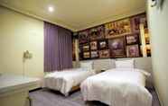 Kamar Tidur 3 Anshun Hotel