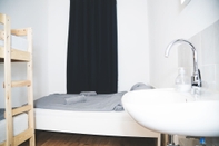 Kamar Tidur Bed'n'Work Apartment Mitte