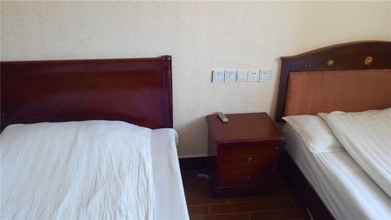 Kamar Tidur 4 Nanchang Wenying Hotel