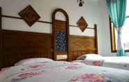 Kamar Tidur 2 Wo Niu Downtown Inn