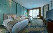 Kamar Tidur 7 Grand New Centery Hotel Leshan