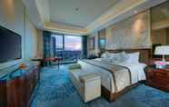 Kamar Tidur 5 Grand New Centery Hotel Leshan