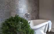 Phòng tắm bên trong 4 Tenuta di Poggio Cavallo