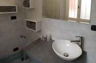 Phòng tắm bên trong Asfodelo Rooms