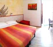 Phòng ngủ 4 Hotel Giorgetti Orange