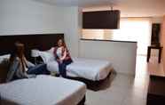 Bedroom 6 ICON 48 Luxury Apartasuites