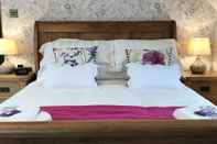Phòng ngủ Lon Y Traeth Bed & Breakfast