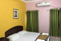 ห้องนอน Indraprastham Tourist Home