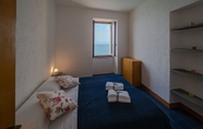 Bedroom 7 Il Baluardo Sea View Apartment on the Cliff