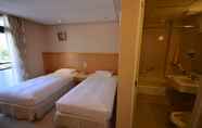 Bilik Tidur 4 Honeymoon Hotel