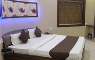 Bedroom 6 Hotel Empire Gandhidham