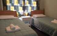 Kamar Tidur 4 Delamain Holiday House and B&B