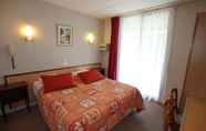 Bedroom 5 Au Primerose Hotel