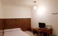 Kamar Tidur 4 Flyk Hotel