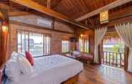 Phòng ngủ 4 Wooden Lodge Homestay