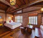 Bedroom 5 Wooden Lodge Homestay