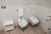 In-room Bathroom Relais Milò