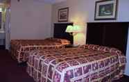 Bedroom 2 Carom Inn a Travelodge by Wyndham Denham Springs/Baton Rouge