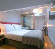 Kamar Tidur 3 Santa Catarina FLH Suites