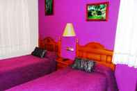 Phòng ngủ Hostal Casa Castro
