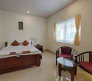 Bedroom 6 Varuna Inn Banquets & Resort