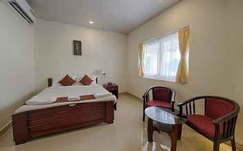 Phòng ngủ 4 Varuna Inn Banquets & Resort