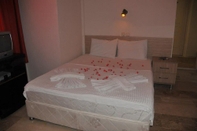 Kamar Tidur Mut Hotel