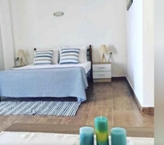 Phòng ngủ 4 Grande Blue Suites with private bay