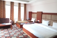 Bedroom Hotel Natraj International