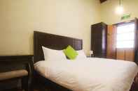 ห้องนอน Longmen Inn Bed and Breakfast