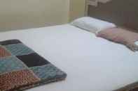 Phòng ngủ Hotel Rajendra Residency