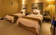 Kamar Tidur 4 Gusto Hotel