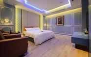 Kamar Tidur 7 Chen He Spa Motel