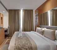 Bedroom 7 Beacon Hotel Nirman Vihar New Delhi