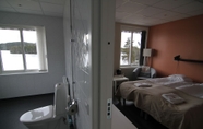 Phòng ngủ 3 Harsa Hotell, Vandrarhem & Stugby