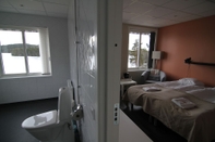 Phòng ngủ Harsa Hotell, Vandrarhem & Stugby