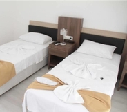 Kamar Tidur 6 Arikanda Hotel 2