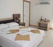 Kamar Tidur 7 Arikanda Hotel 2