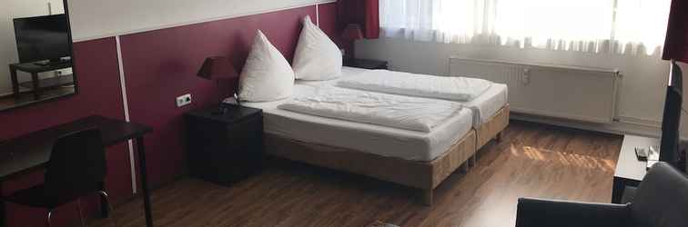 Kamar Tidur Garni Hotel Lore