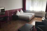 Kamar Tidur Garni Hotel Lore