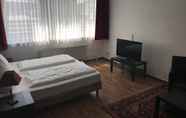 Kamar Tidur 4 Garni Hotel Lore