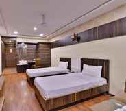 Bedroom 7 Hotel puneet international