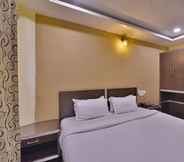 Bedroom 6 Hotel puneet international