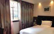 Bedroom 4 Xiandai Huayuan Hotel