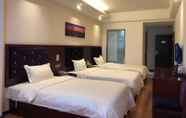 Bedroom 2 Xiandai Huayuan Hotel