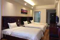 Bedroom Xiandai Huayuan Hotel