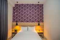 Kamar Tidur Rainbow Hotel