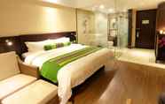 Kamar Tidur 4 Relaxed Season Hotel Longcheng Branch